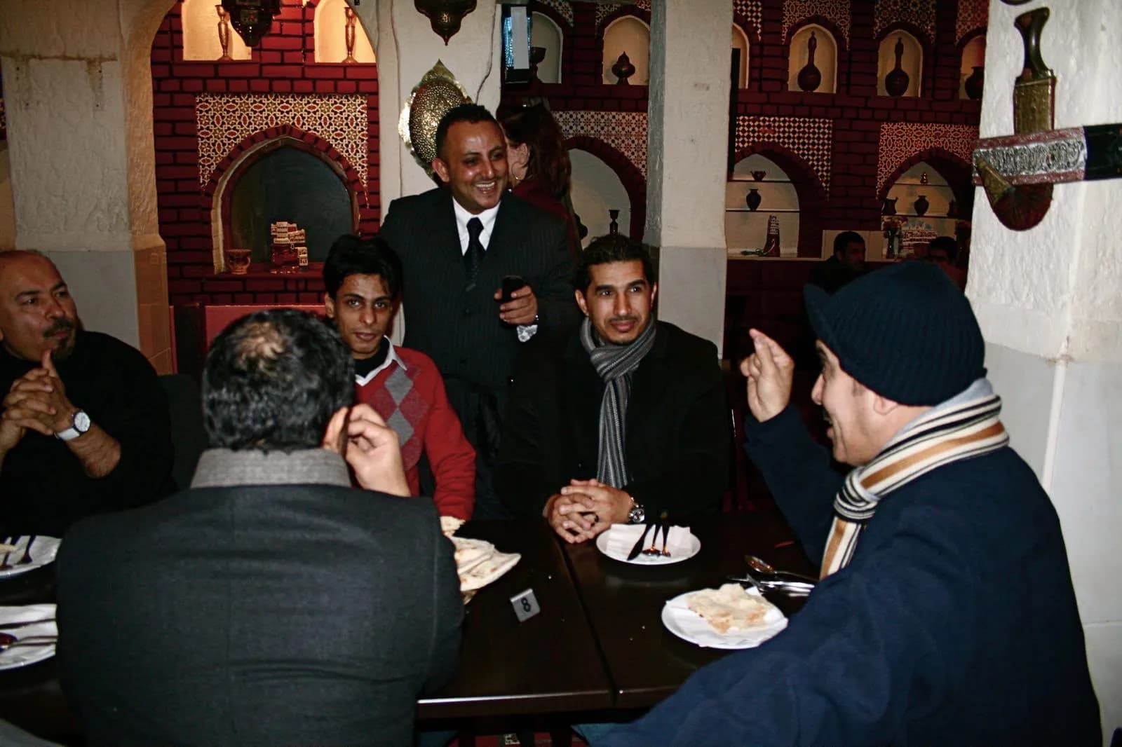 Rafiq Al-Awdi, our founder, with guests in the dining room